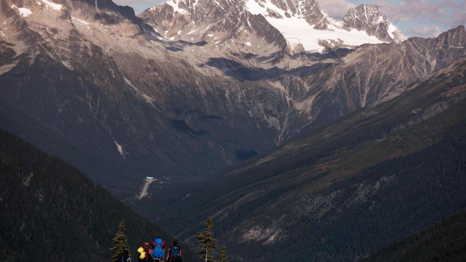 Hikers overlook the vistas of Rogers Pass